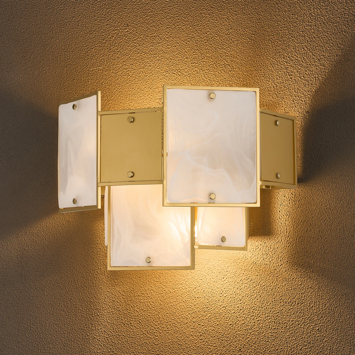 Gold wall sconce with rectangular frosted glass panels