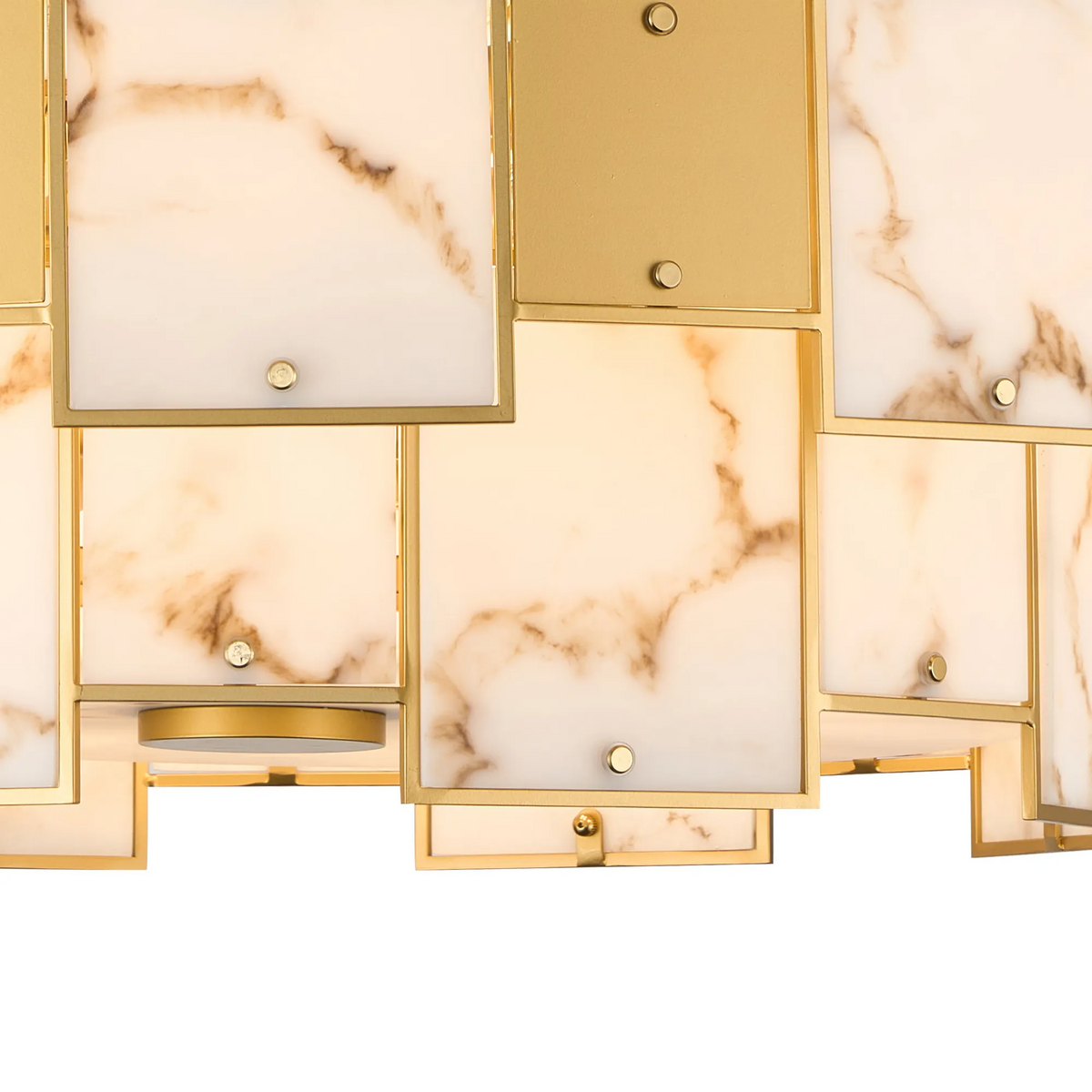 Close-up of a gold and marble chandelier with square panels