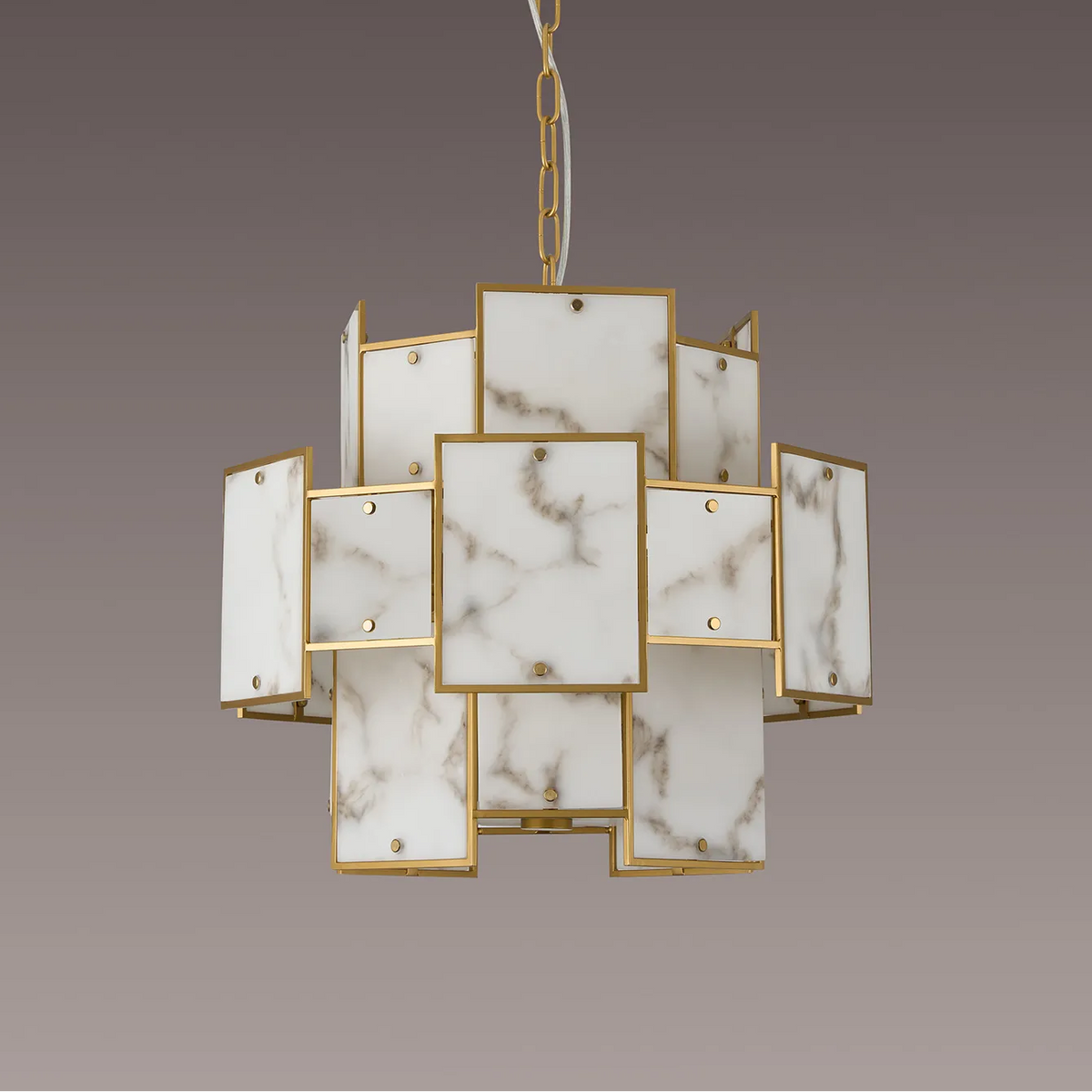 Gold chandelier with white marble-patterned rectangular panels