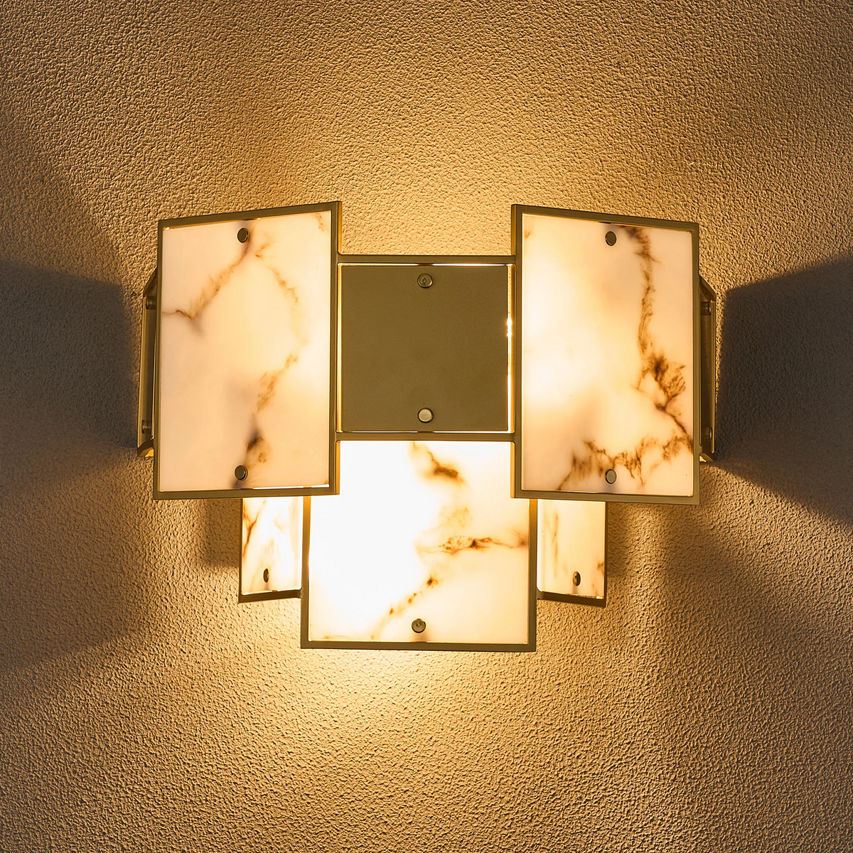 Art Deco wall sconce with five rectangular alabaster panels and a brass frame