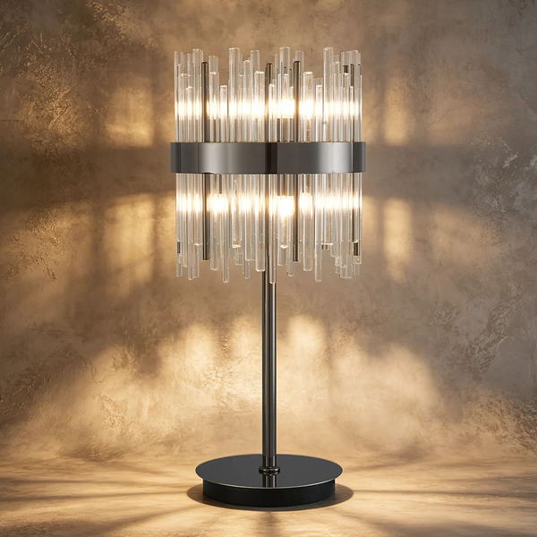 Table lamp with a black base and stand, and a cylindrical shade made of clear glass rods