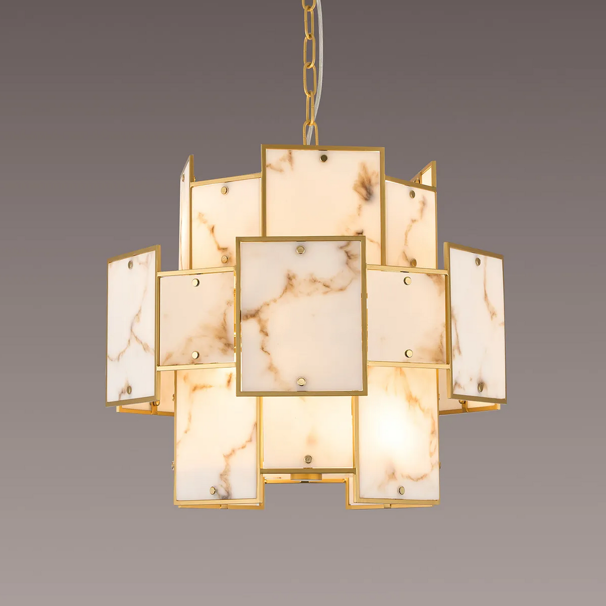 Gold chandelier with rectangular white marble panels