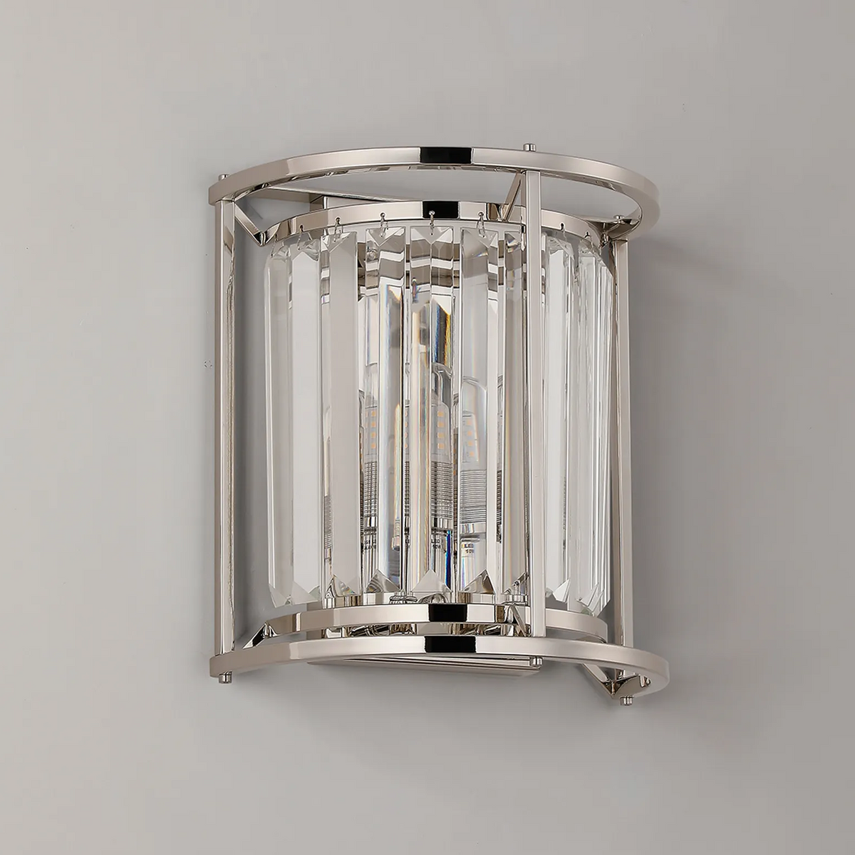 Polished nickel wall sconce with clear crystal rods