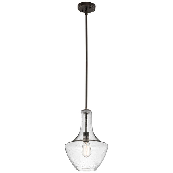 Bronze pendant light with a clear seeded glass bell-shaped shade and exposed bulb.