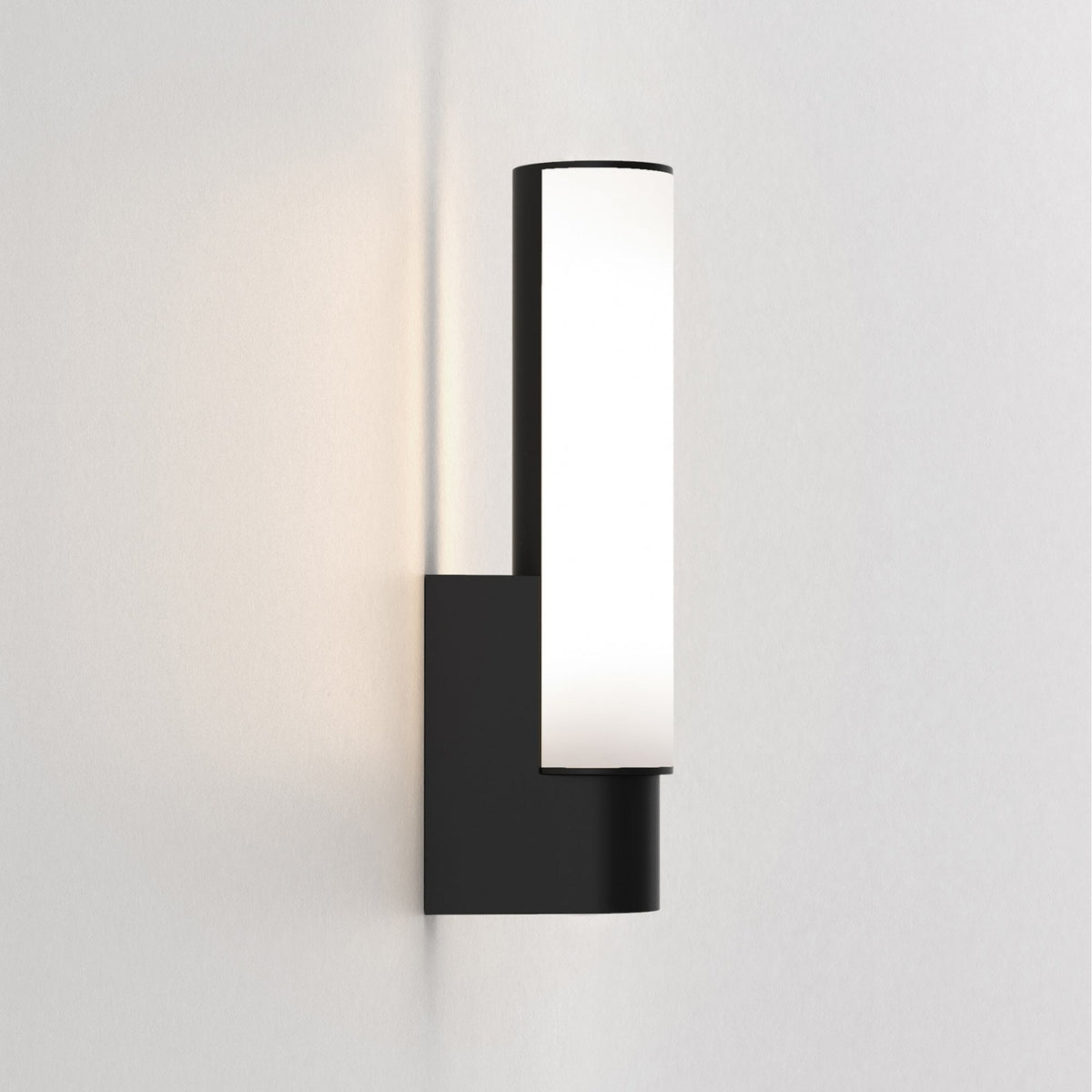 Black rectangular wall light with a vertical white illuminated panel