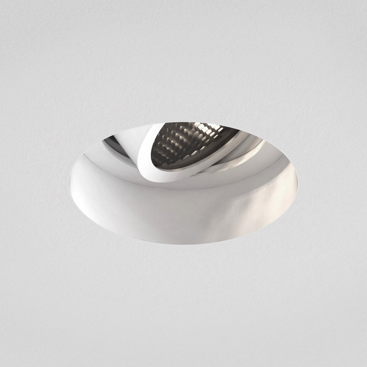 Recessed ceiling light with a dark, textured interior reflector