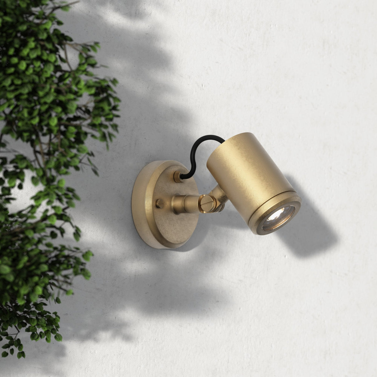Jura Single Spot Wall Light in Solid Brass