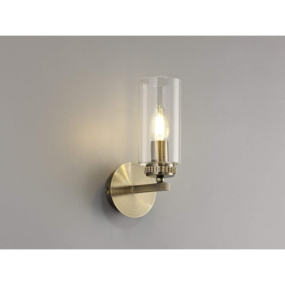 Dunstone Switched Single Arm Wall Light in Antique Brass