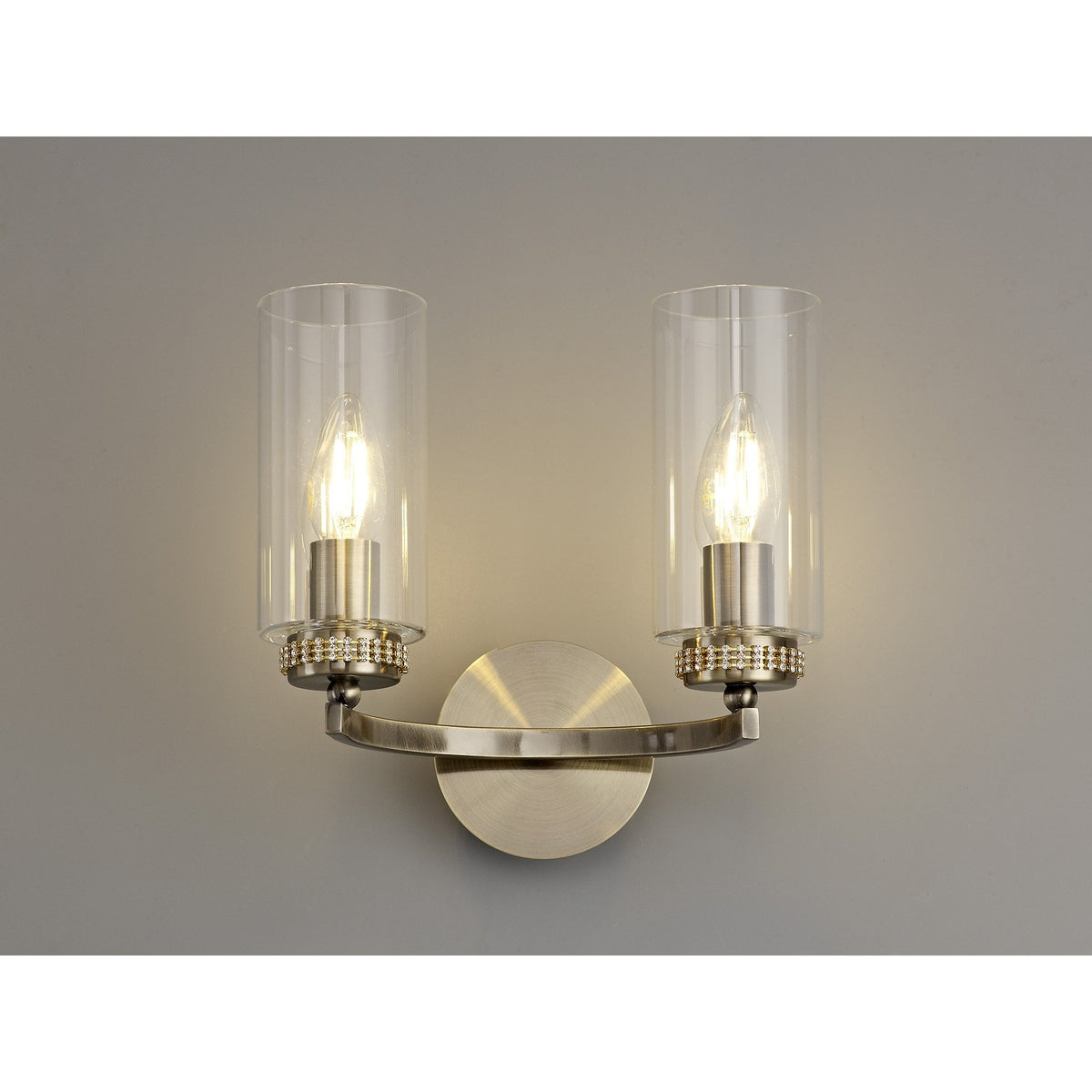 Dunstone Switched Twin Arm Wall Light in Antique Brass