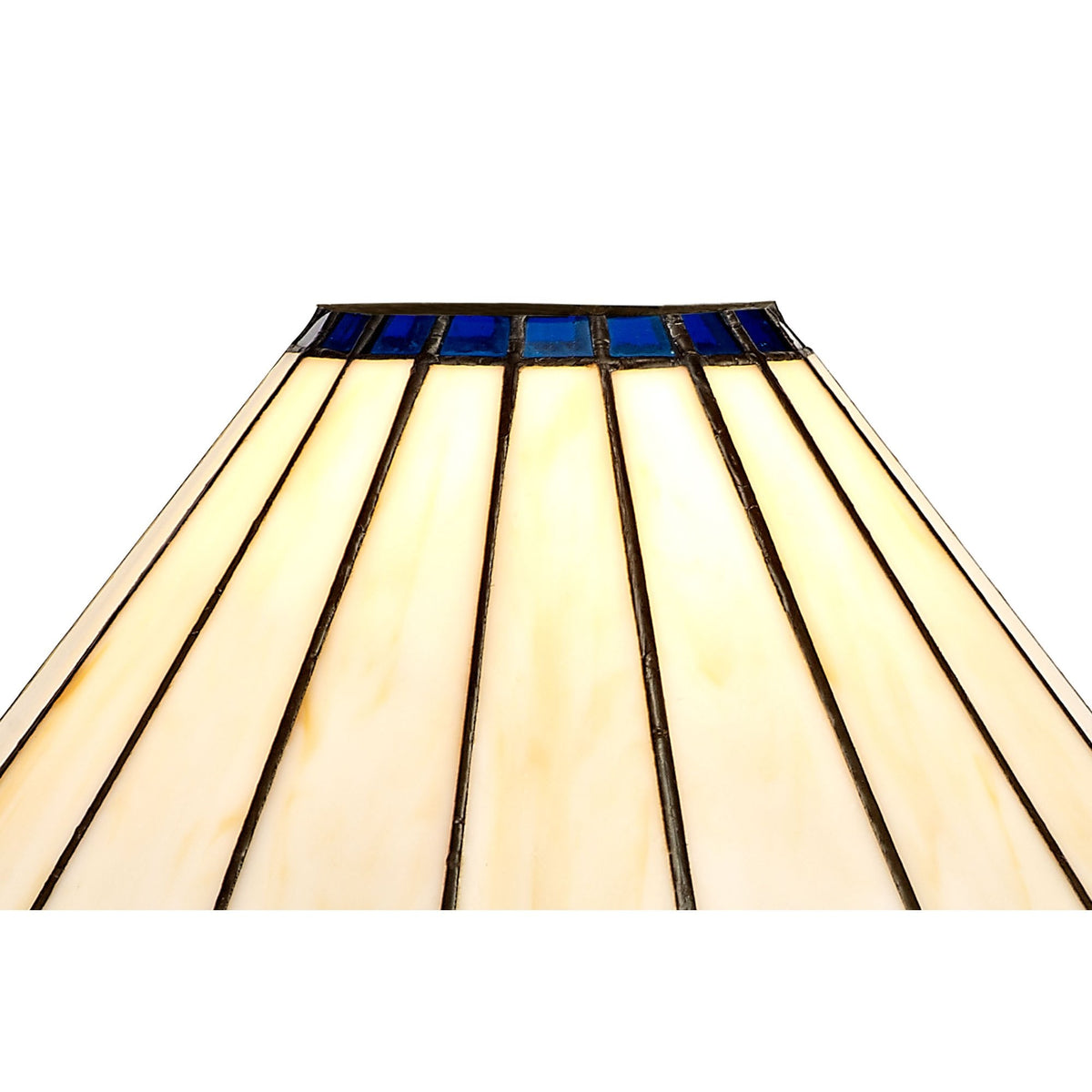 Close-up of the top section of a white and blue stained glass lampshade.