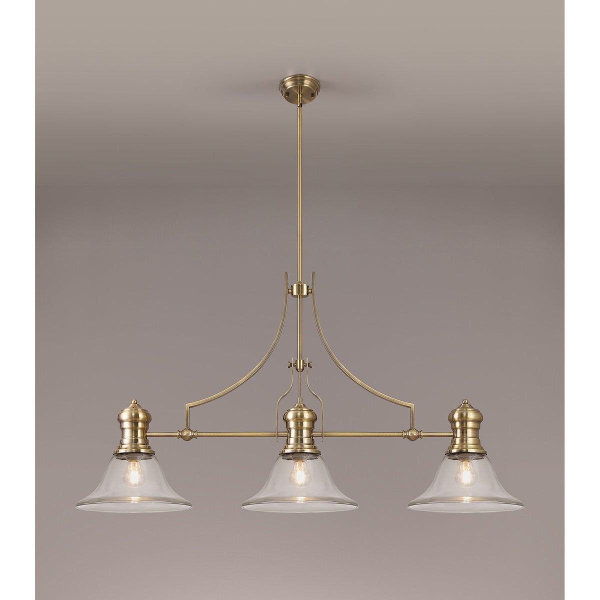 Fremington Linear Pendant in Antique Brass with Smooth Bell Glass Shades