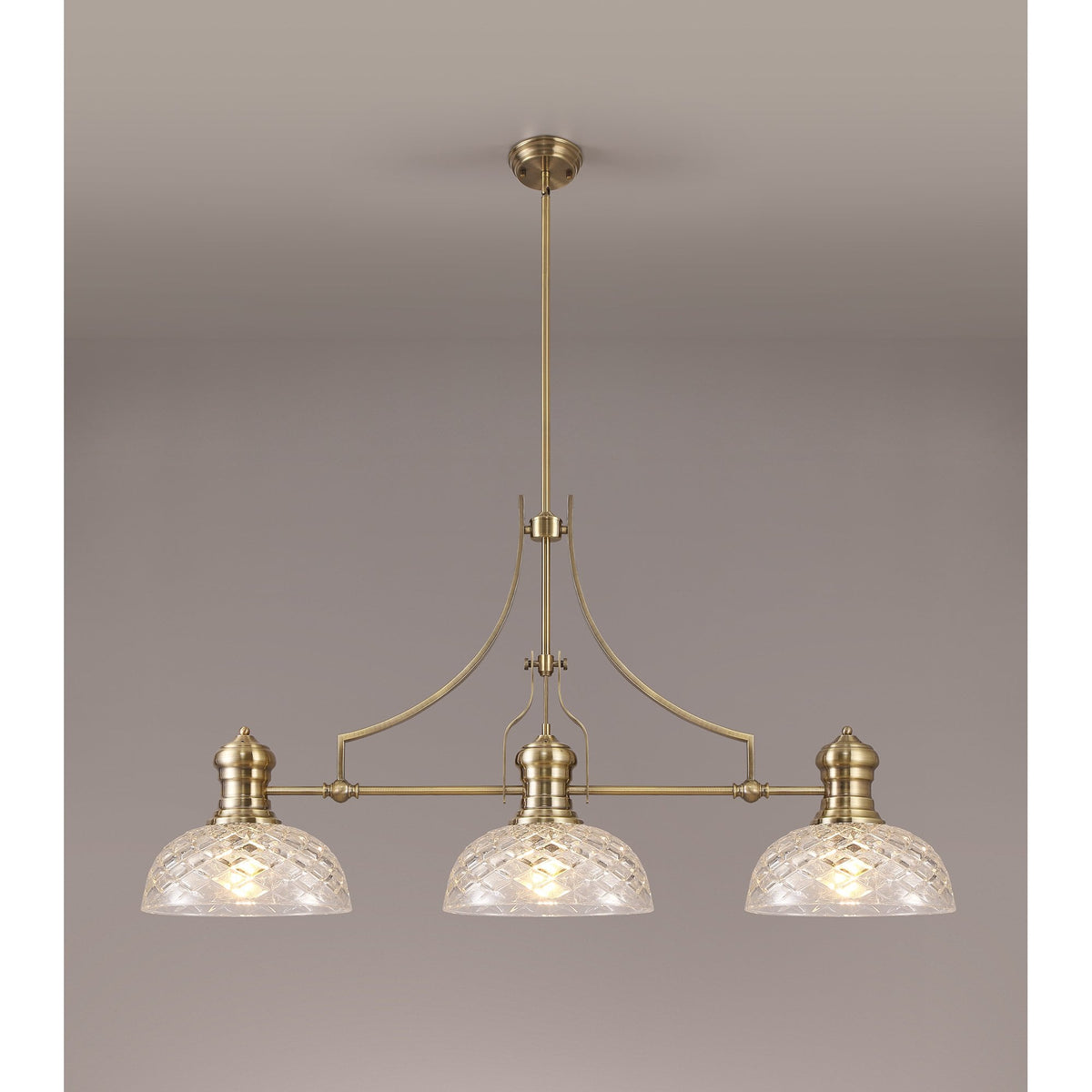 Fremington 3 Light Linear Pendant in Antique Brass With Clear Glass Shade