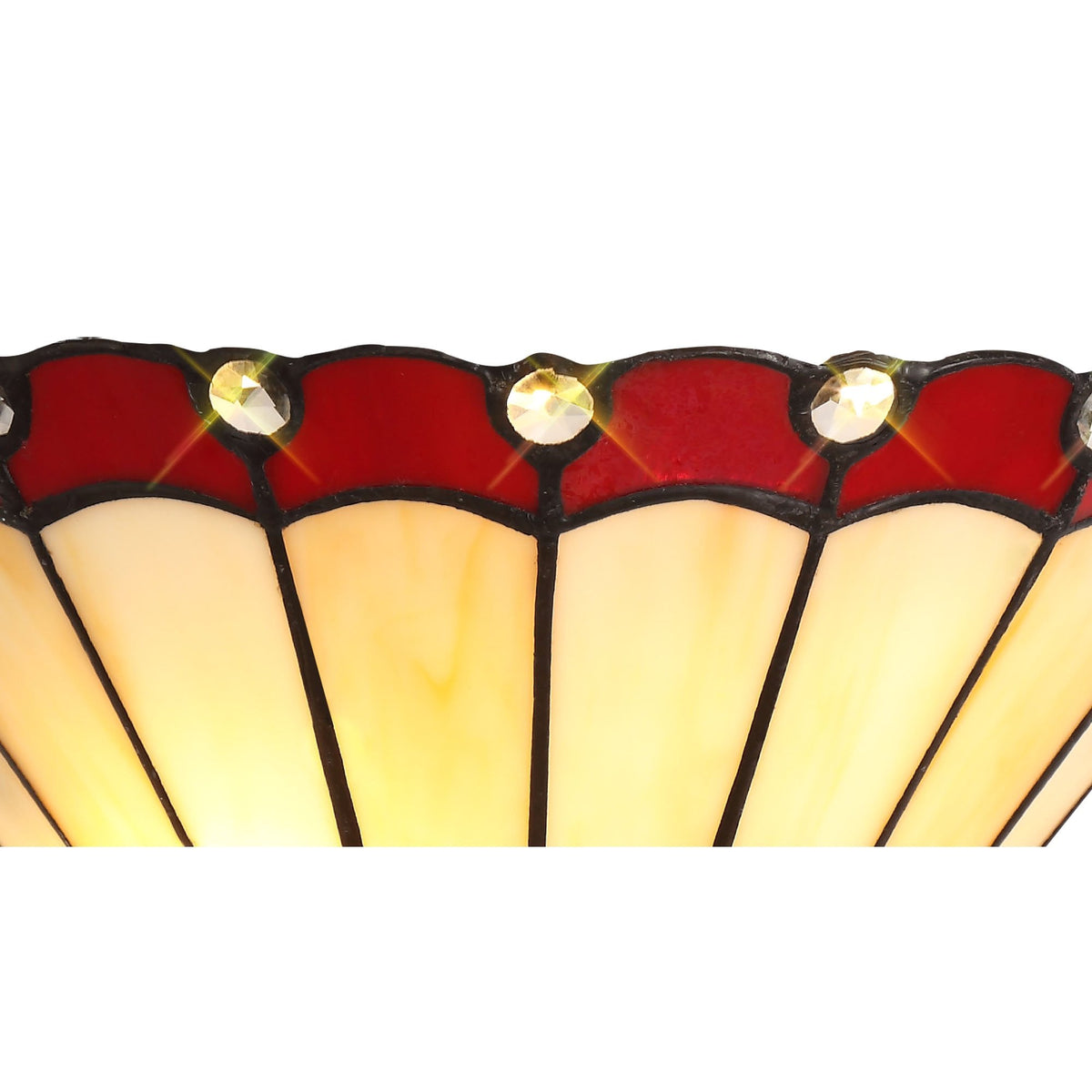 A close-up of the top half of the red and white stained glass wall light.