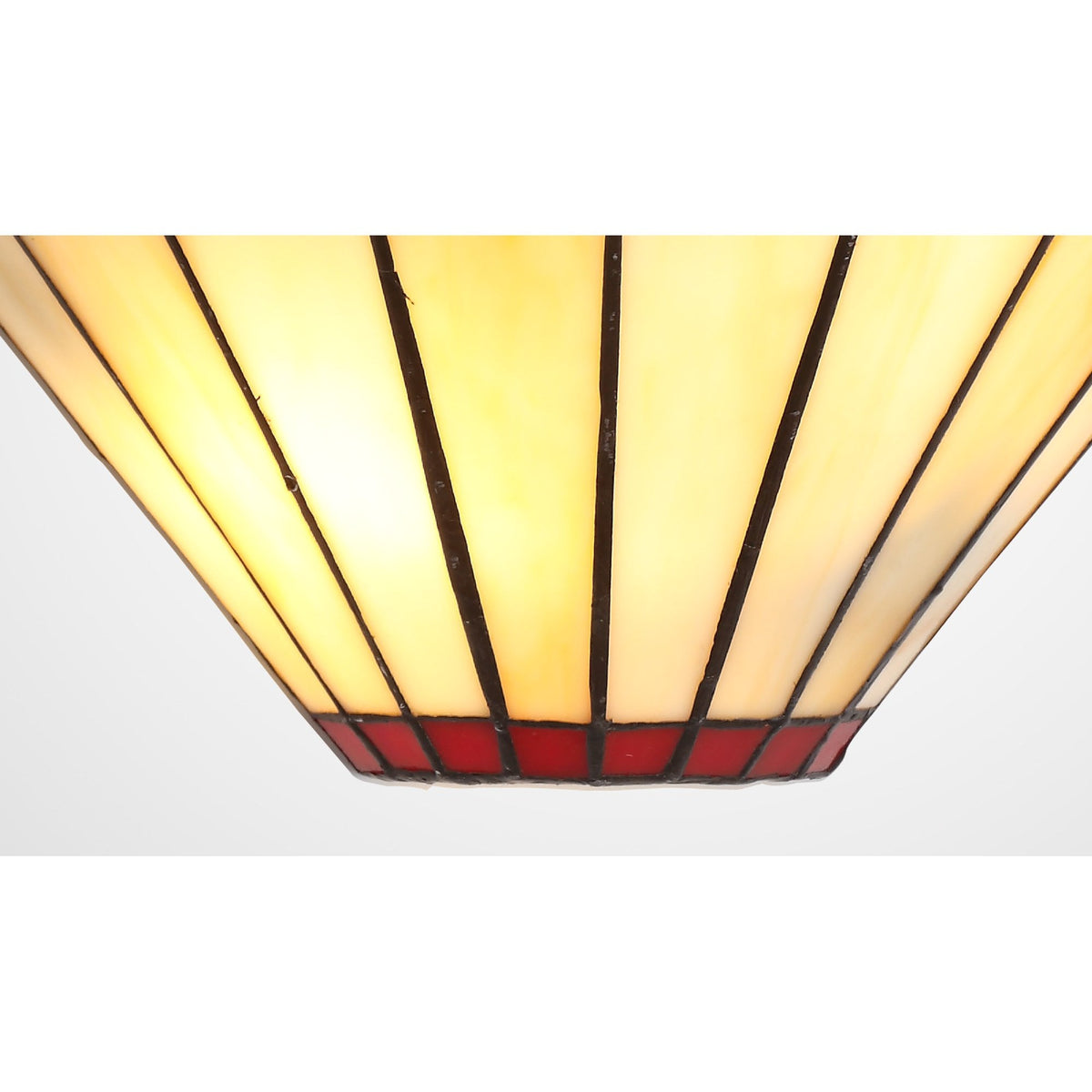 A close-up of the bottom half of the red and white stained glass wall light.