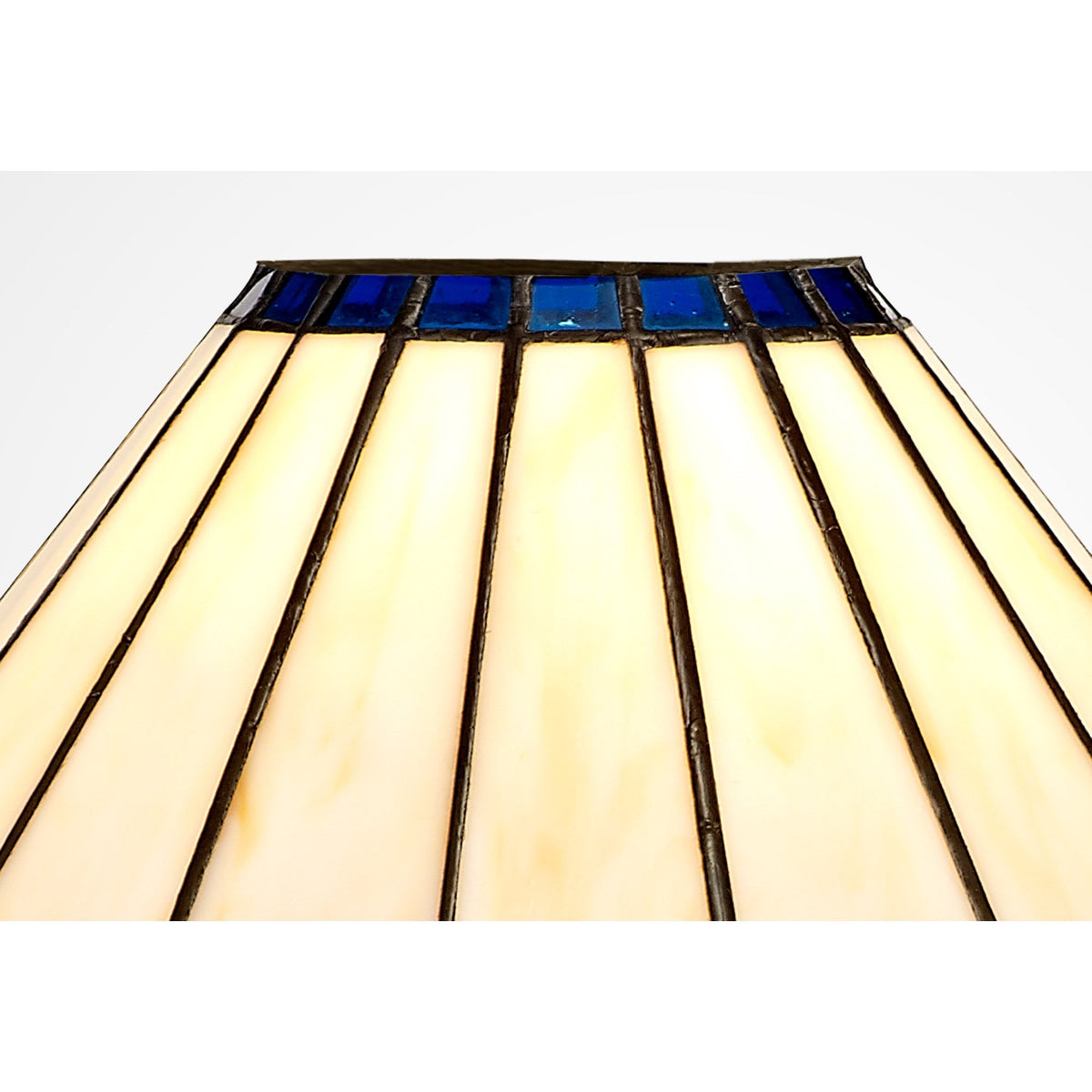 A close up of the top of the Tiffany style lampshade.