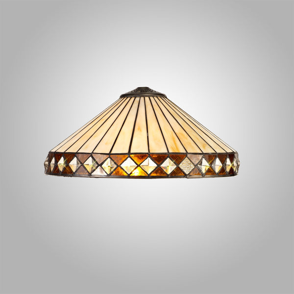 A Tiffany style lampshade, with cream vertical panels and a diamond-patterned amber border.