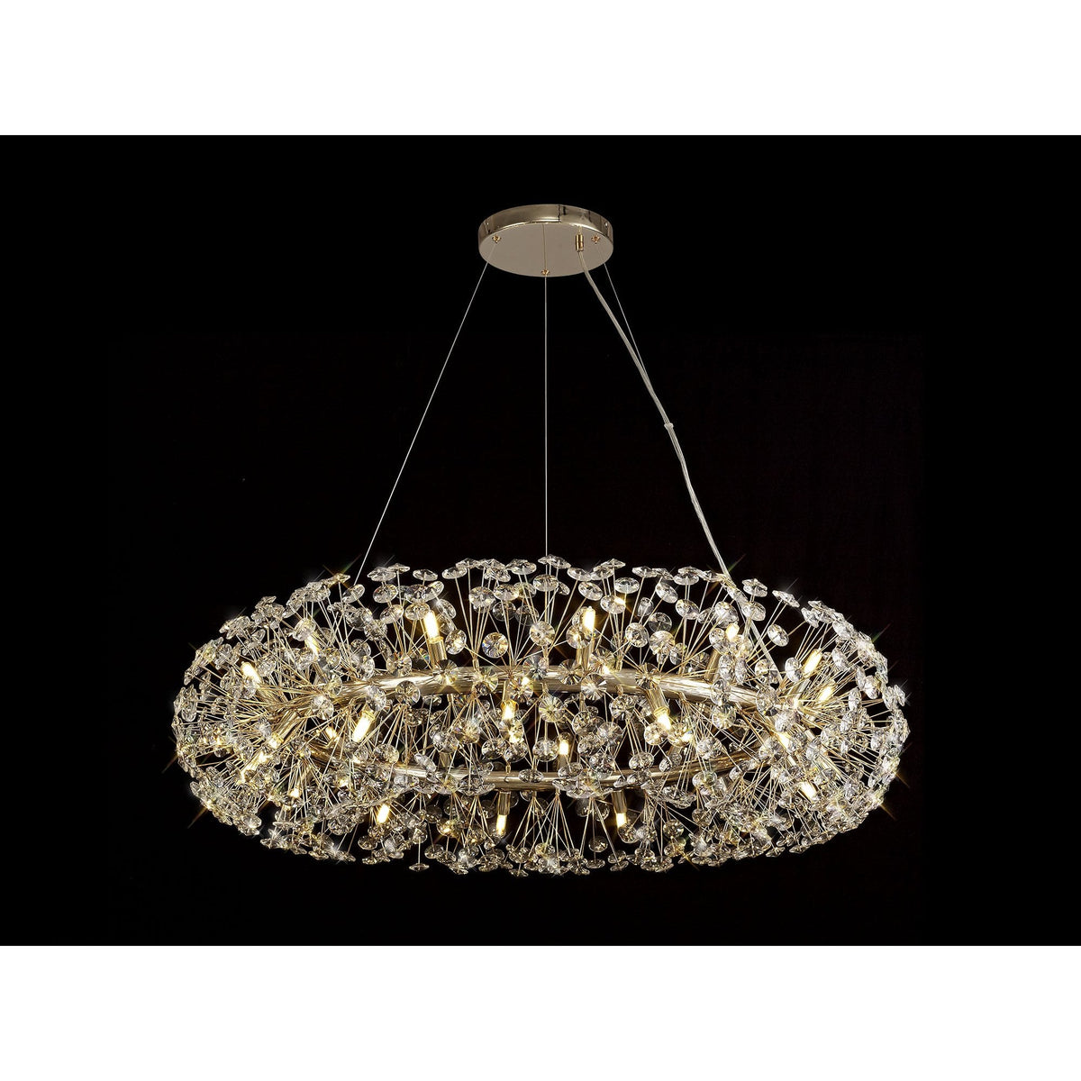 An ornate oval-shaped gold and crystal chandelier, brightly lit against a dark background.