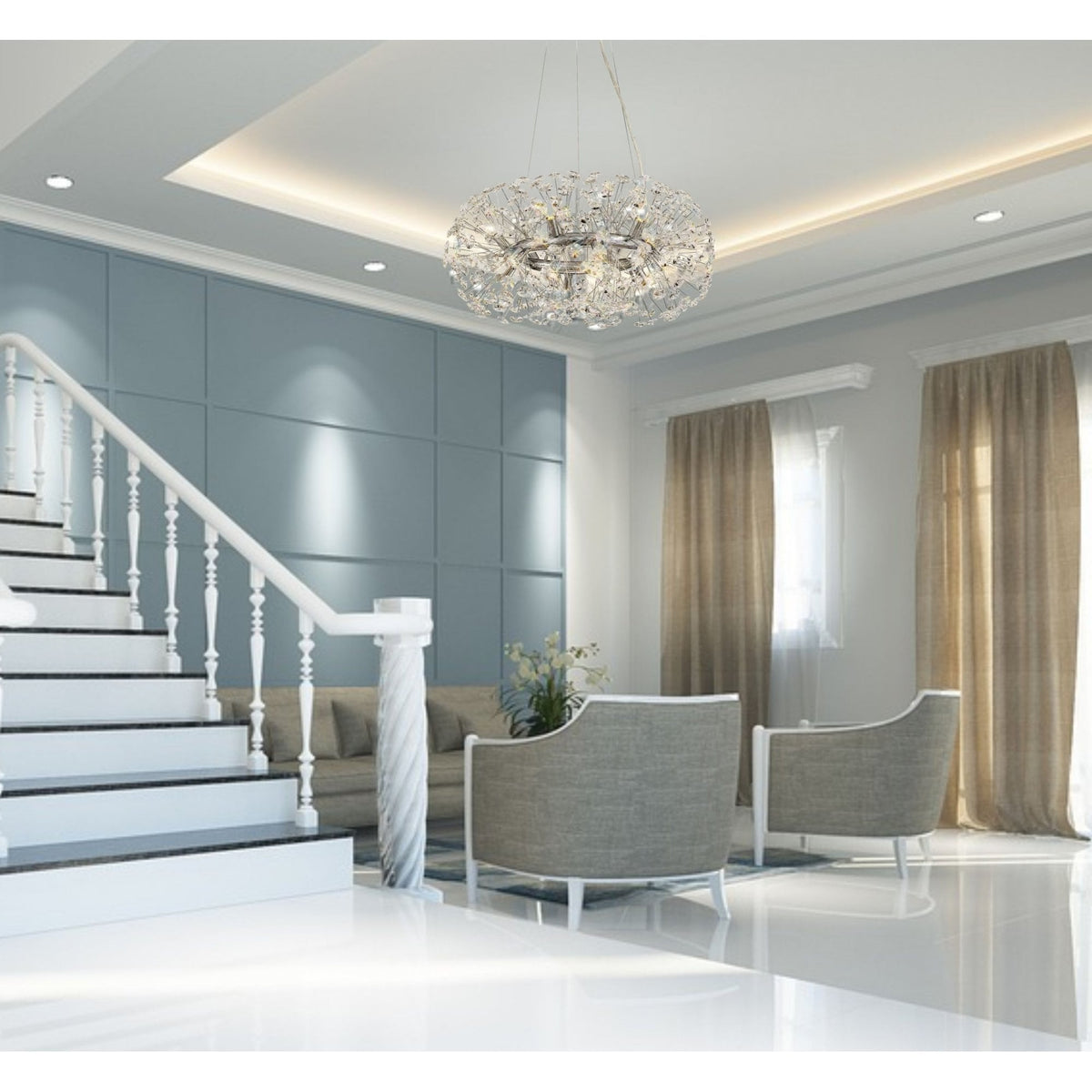 A modern living space with a staircase, featuring a large crystal chandelier.