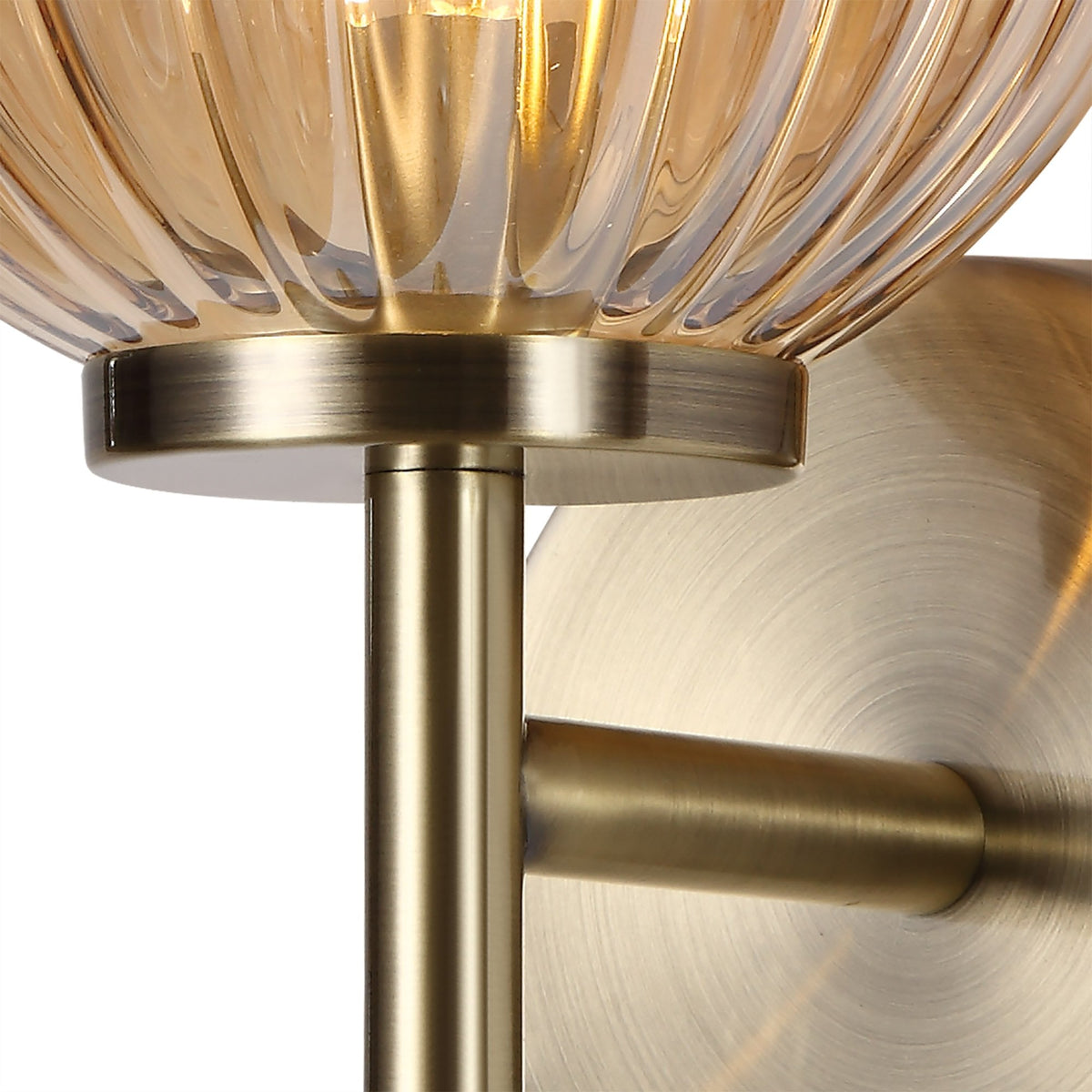 Fiddleford Wall Lamp in Antique Brass and Amber Glass