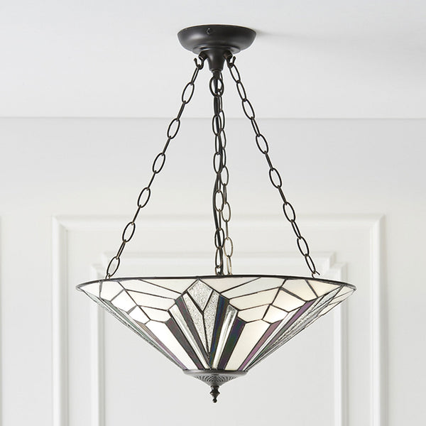 A decorative ceiling light fitting with a white and purple patterned shade and metal chains.