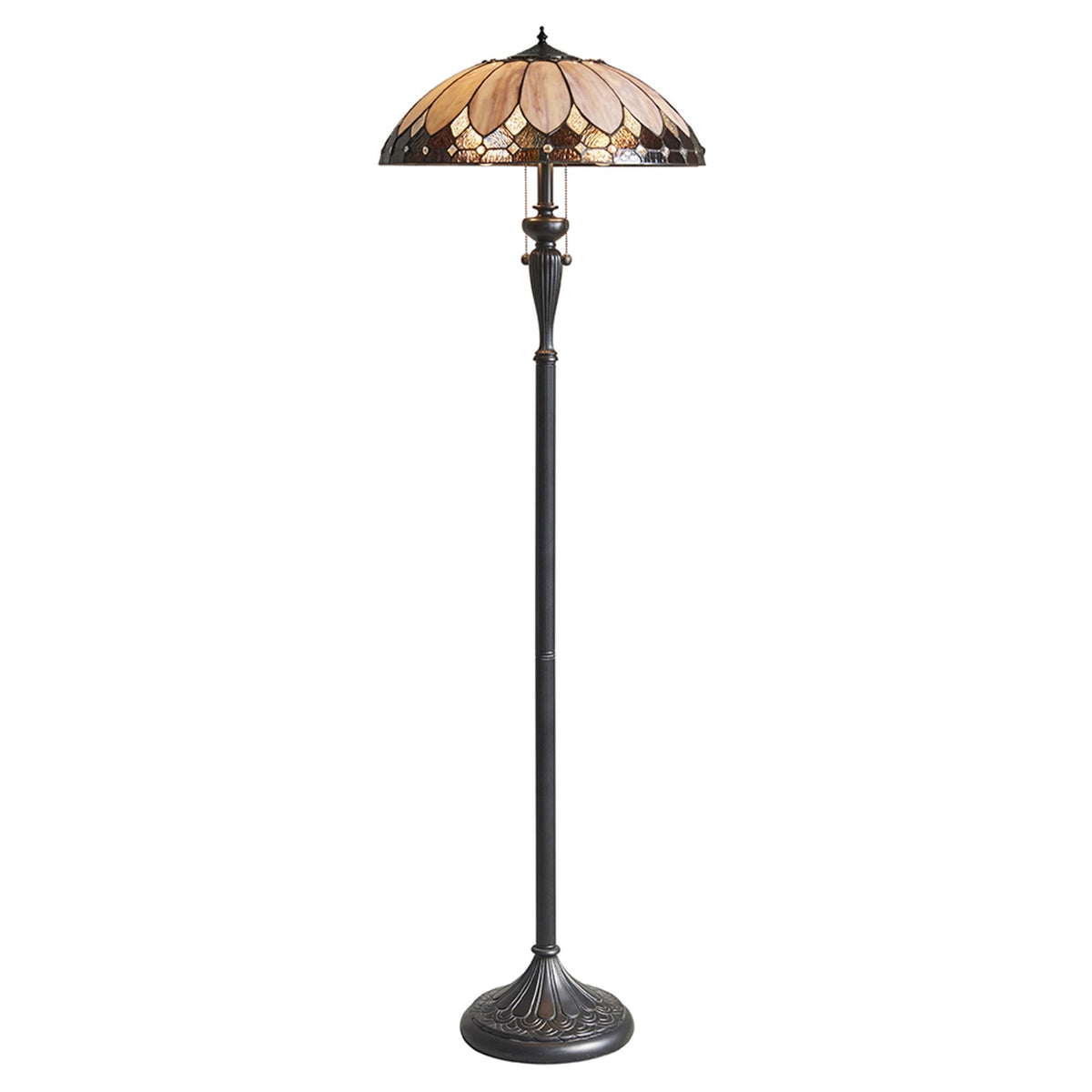 A full-length view of a Tiffany-style floor lamp with an amber and cream stained-glass shade.