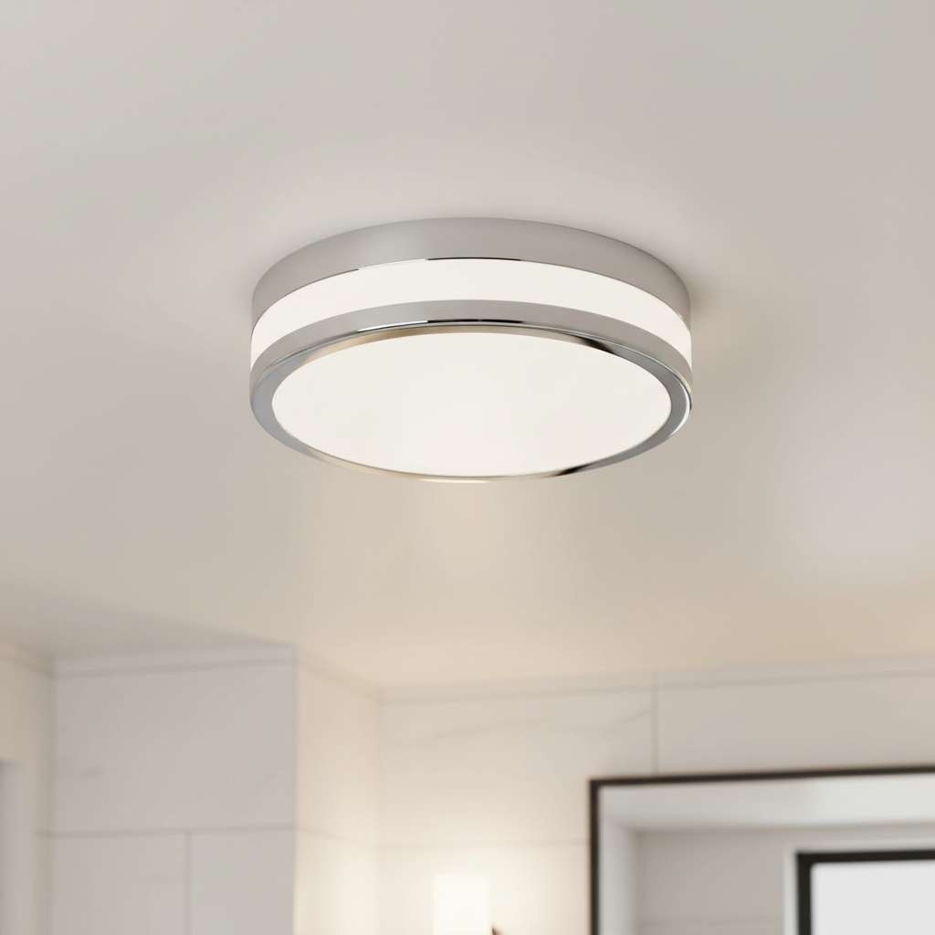 Round chrome ceiling light with a white diffuser and an illuminated band around the edge