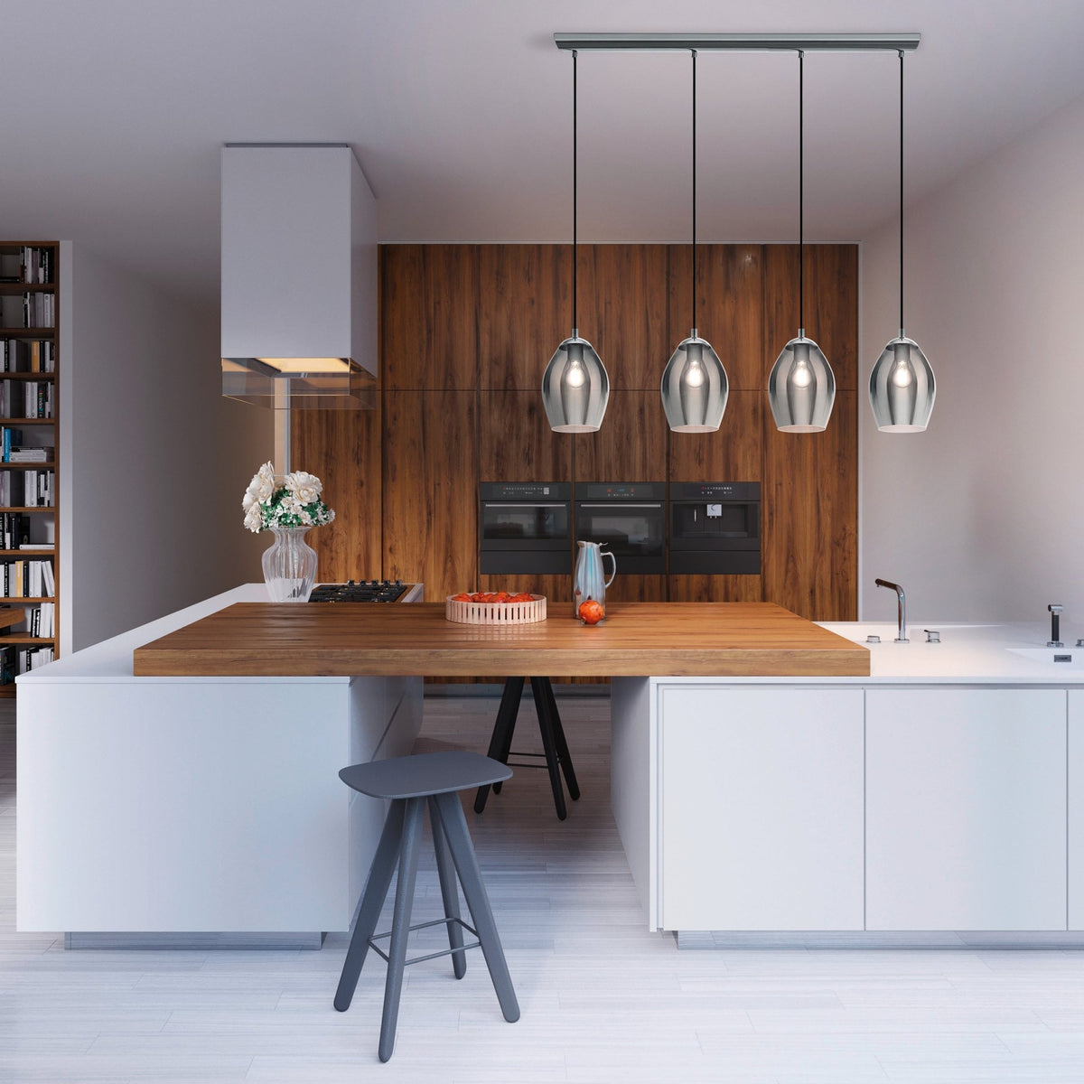 Modern kitchen with a large wooden island, white cabinets, and four pendant lights hanging above.