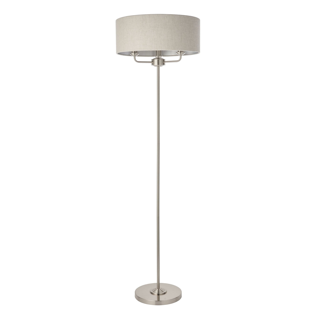 A brushed nickel floor lamp with a light fabric shade on a white background.