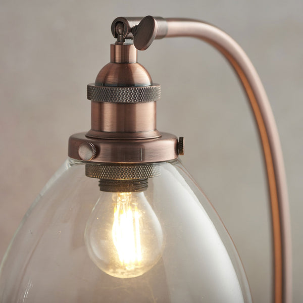 Hansen Task Table Lamp in Aged Copper and Clear Glass Shade