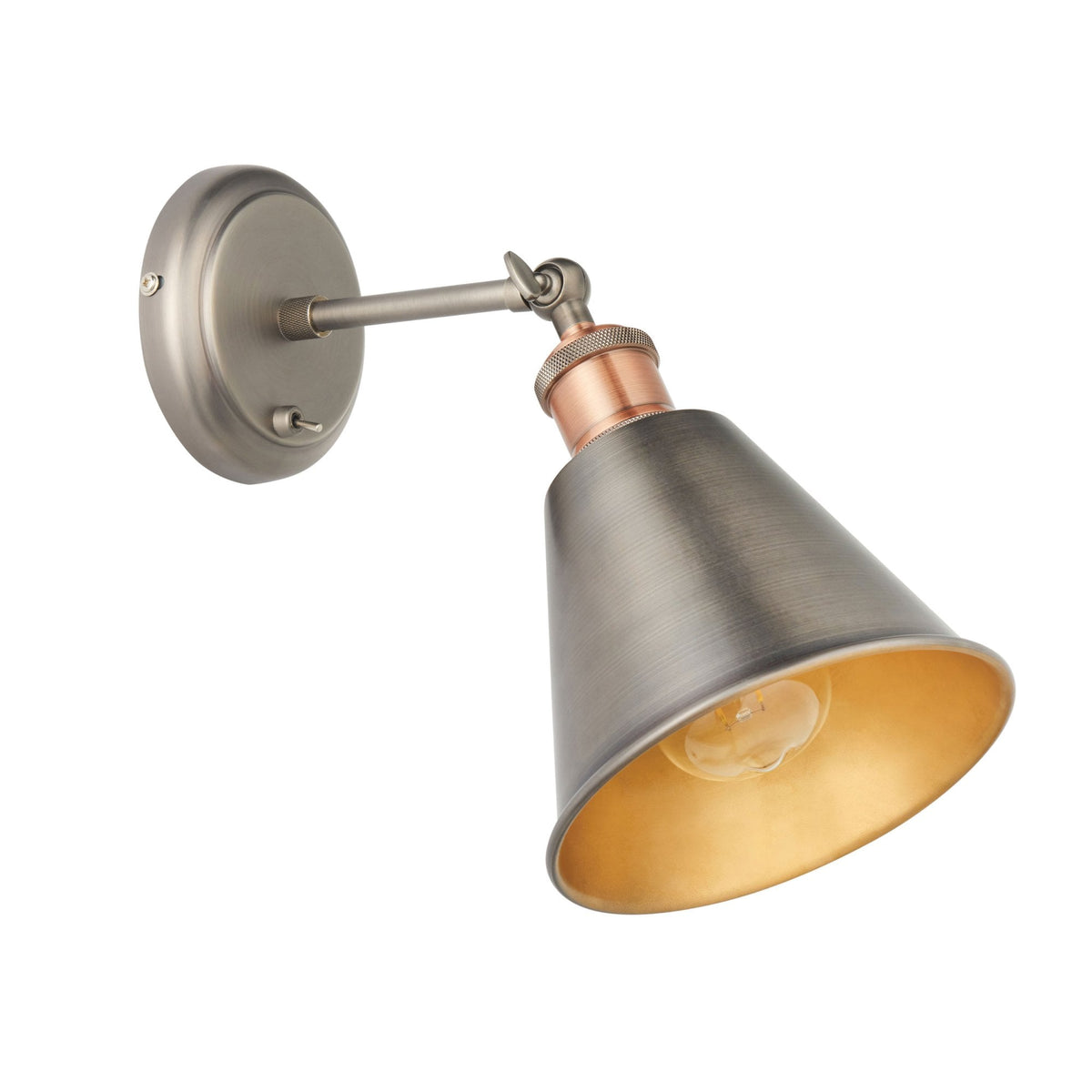 Brushed metal wall light with a conical shade and copper accent, angled downwards with a visible bulb.