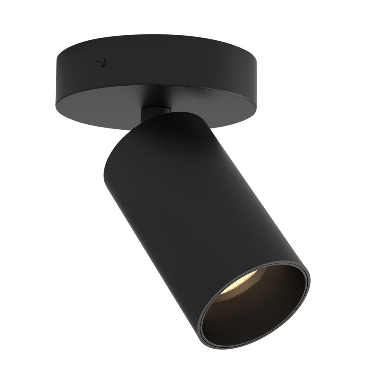 Black cylindrical ceiling spotlight with a warm light glowing from within, mounted on a round base