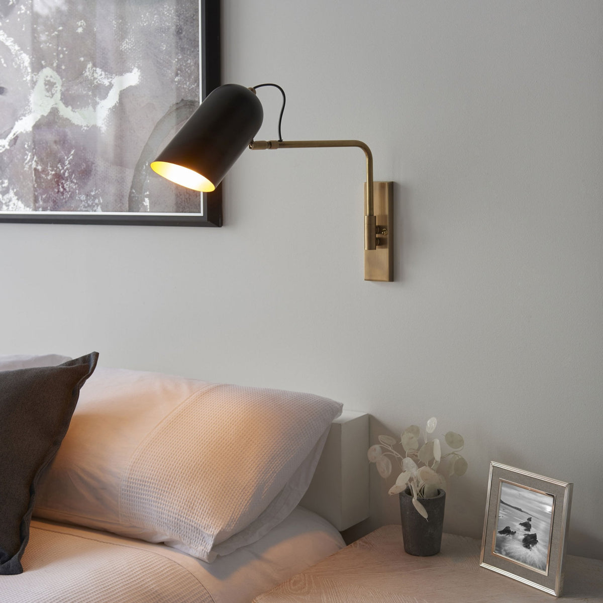 Navren Swing Arm Wall Light in Antique Solid Brass & Matt Black