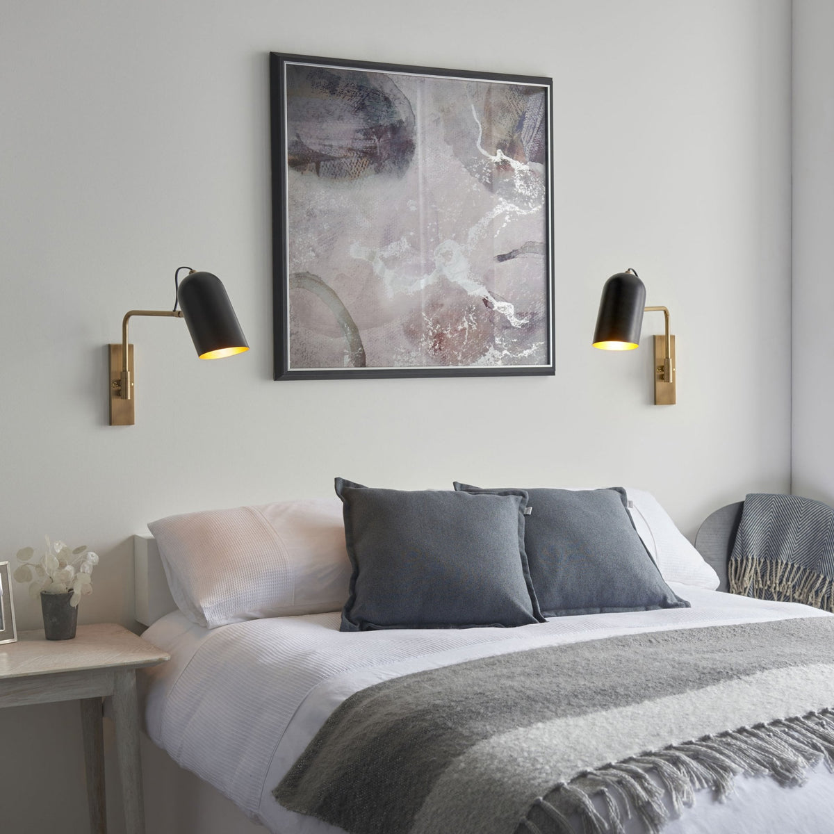 Navren Swing Arm Wall Light in Antique Solid Brass & Matt Black