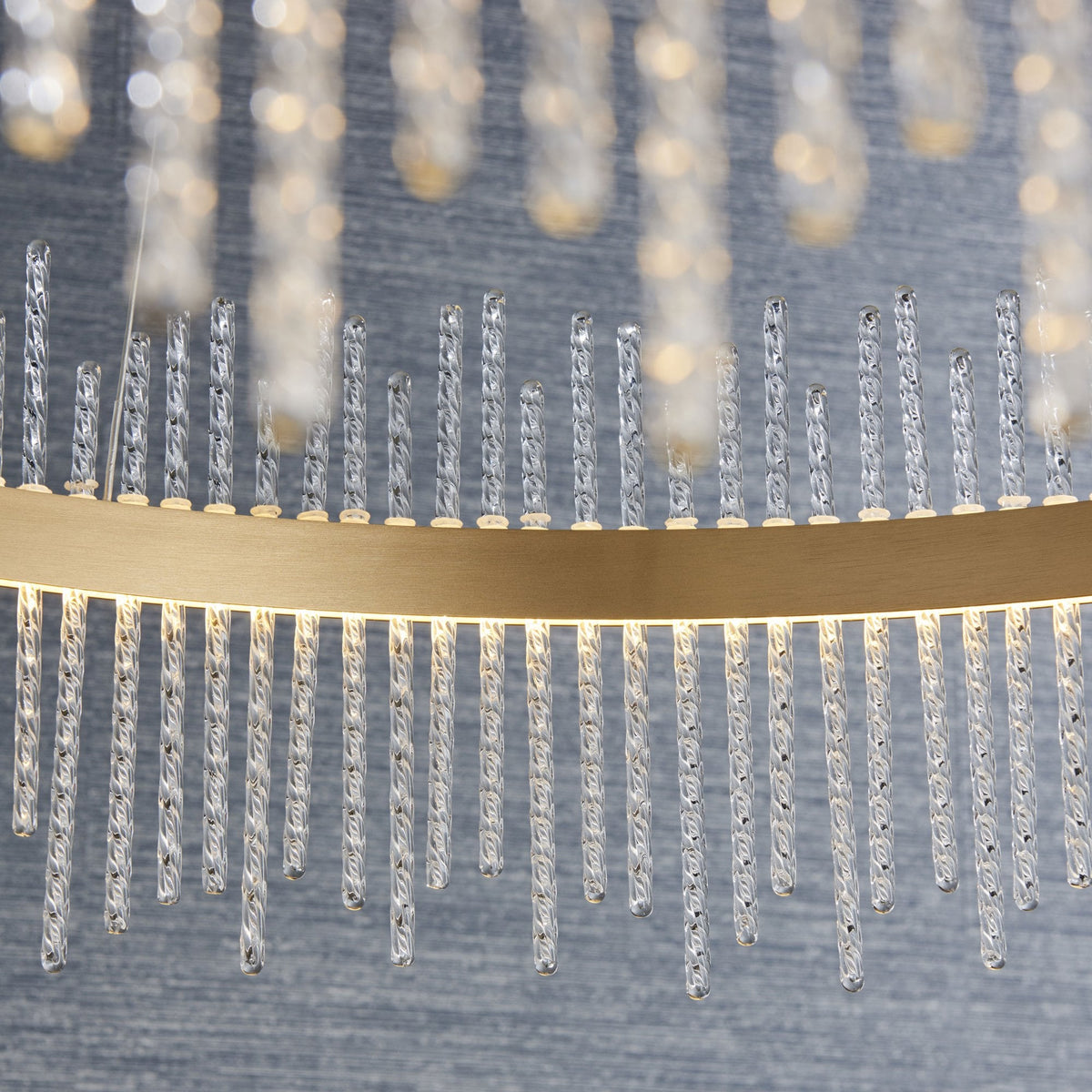 A detailed close-up of the LED chandelier's crystal rods, emphasizing their texture and sparkle. Enhances visual appeal.