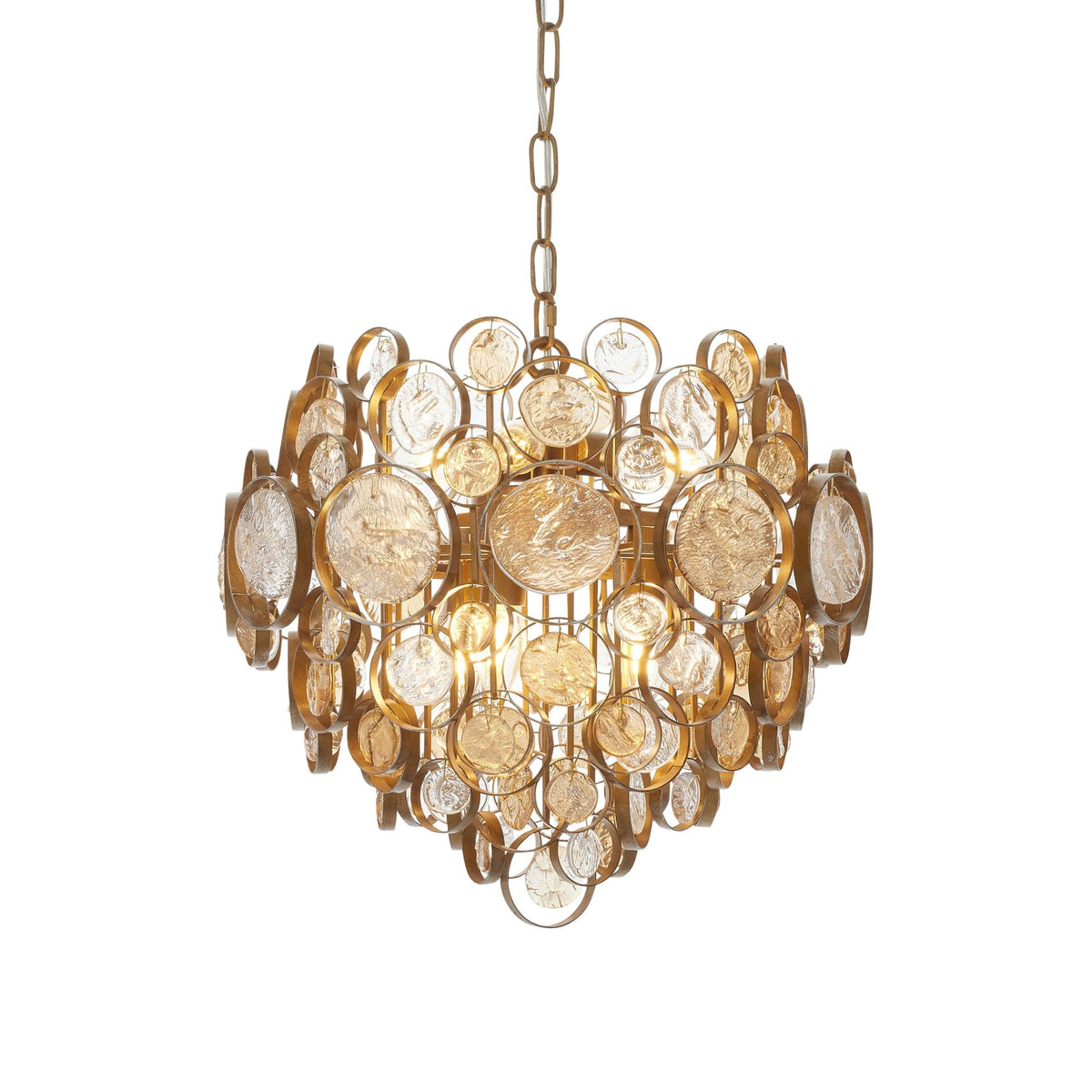 A shimmering gold chandelier adorned with numerous clear and amber glass discs on a white background.