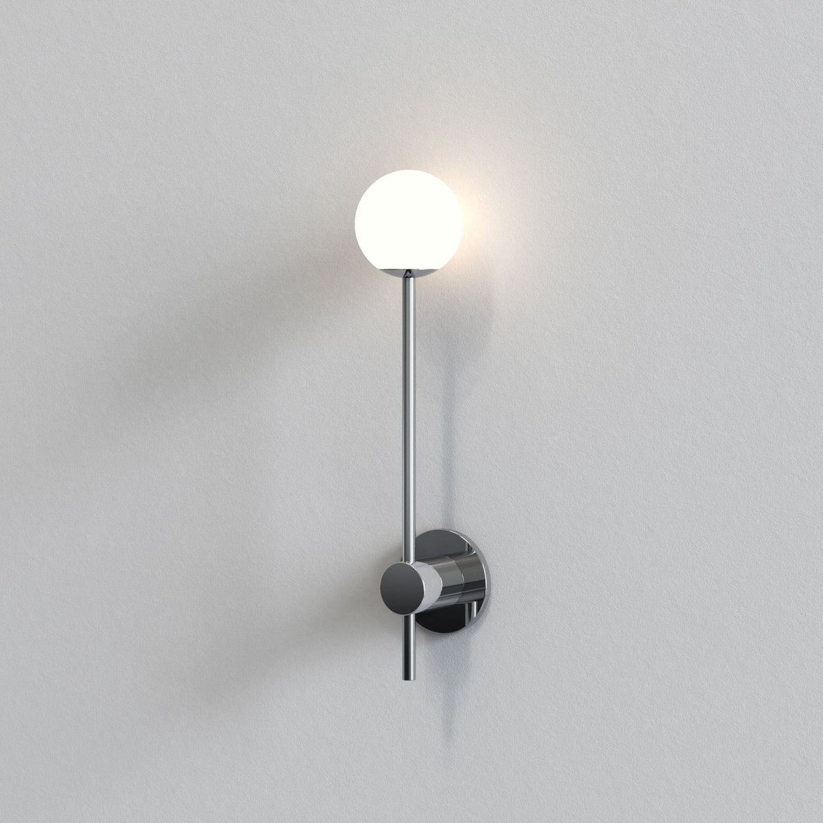 Chrome wall light with a long stem and a spherical white glass shade