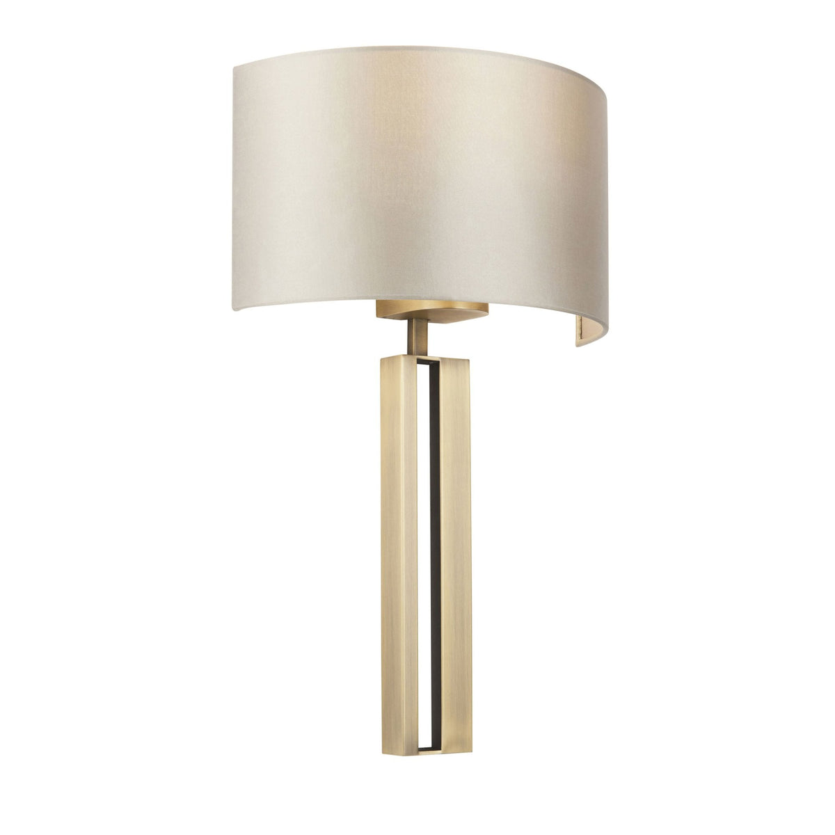 A wall light featuring a rectangular brass base and an off-white, curved fabric shade.