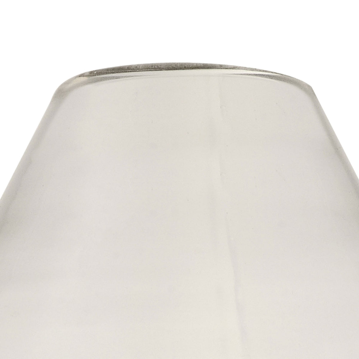 Close-up of the top opening of a white conical lampshade.