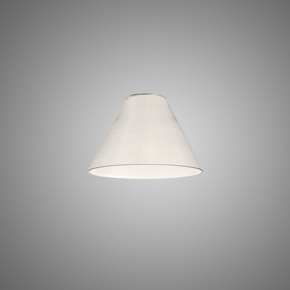 A white conical lampshade on a grey background, illuminated from within.