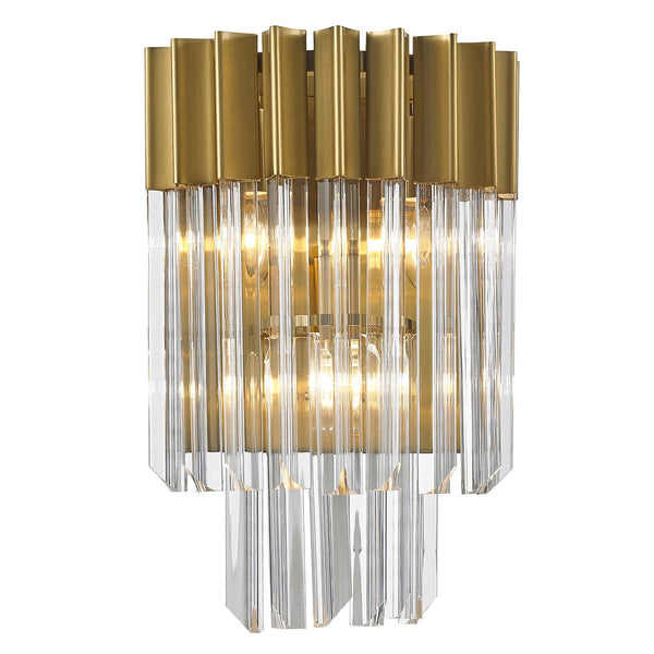 A luxurious wall sconce with a gold frame and clear glass rods, emitting a warm glow.