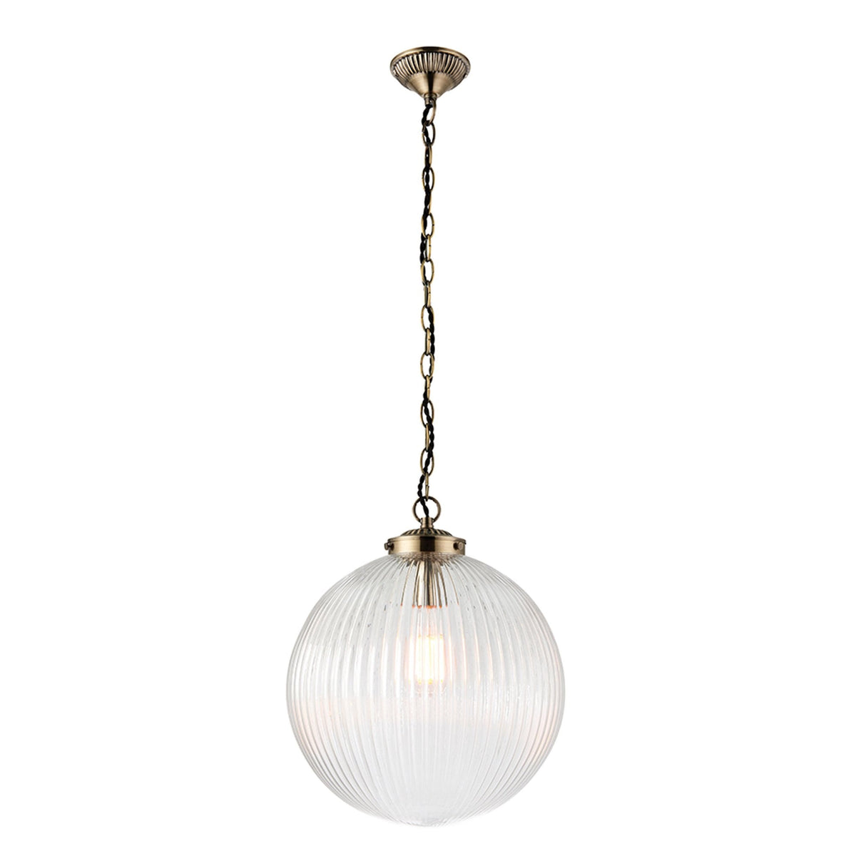 Ribbed glass globe pendant light with an antique brass chain and fitting, on a white background.