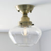 Camberley School House Semi Flush in Antique Brass & Clear Glass