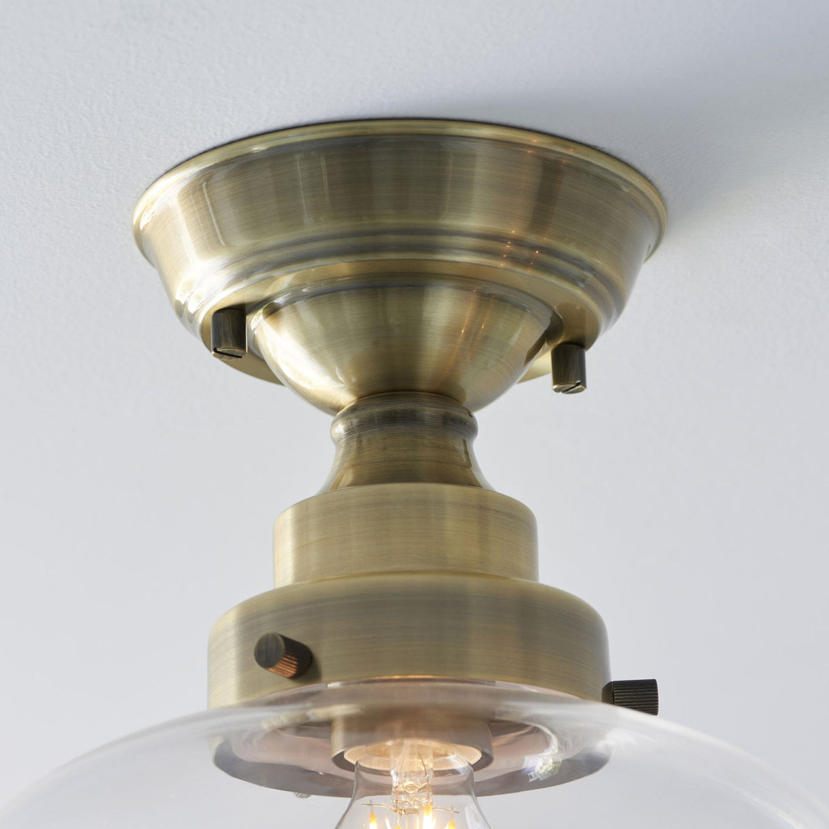 Camberley School House Semi Flush in Antique Brass & Clear Glass