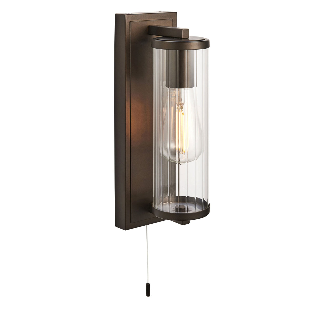 Bronze wall light with a clear ribbed glass shade, exposed filament bulb, and a pull cord switch.