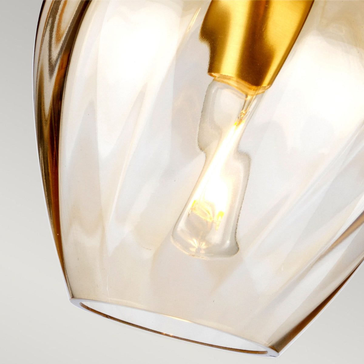 Tiber Single Pendant in Brushed Brass with Amber Glass