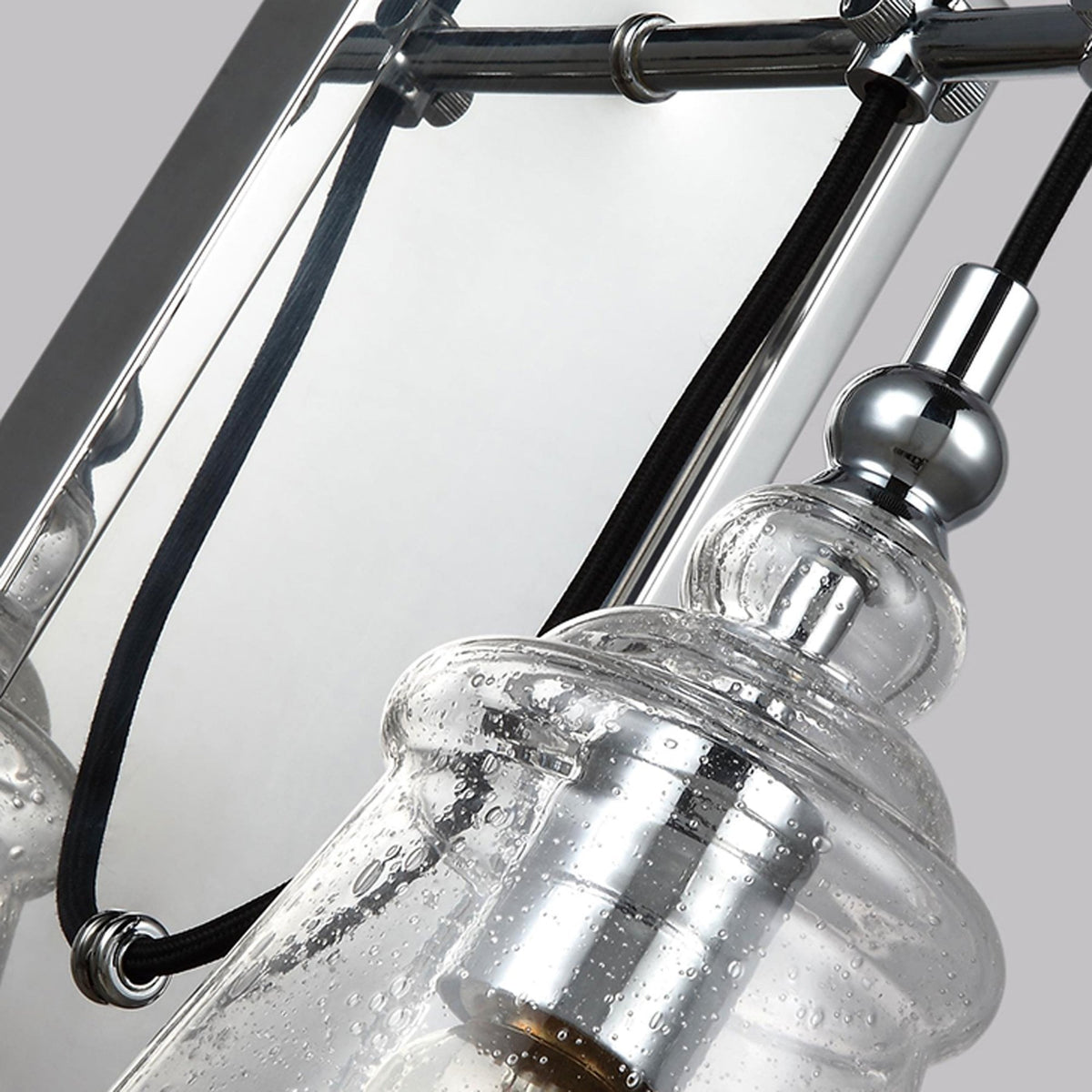 Loras Wall Light in Polished Chrome with Seeded Clear Glass