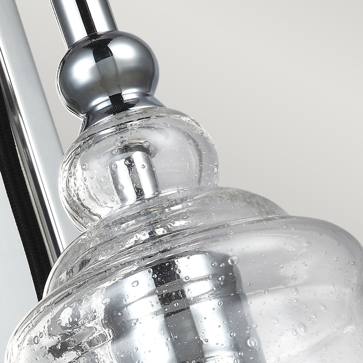 Loras Wall Light in Polished Chrome with Seeded Clear Glass