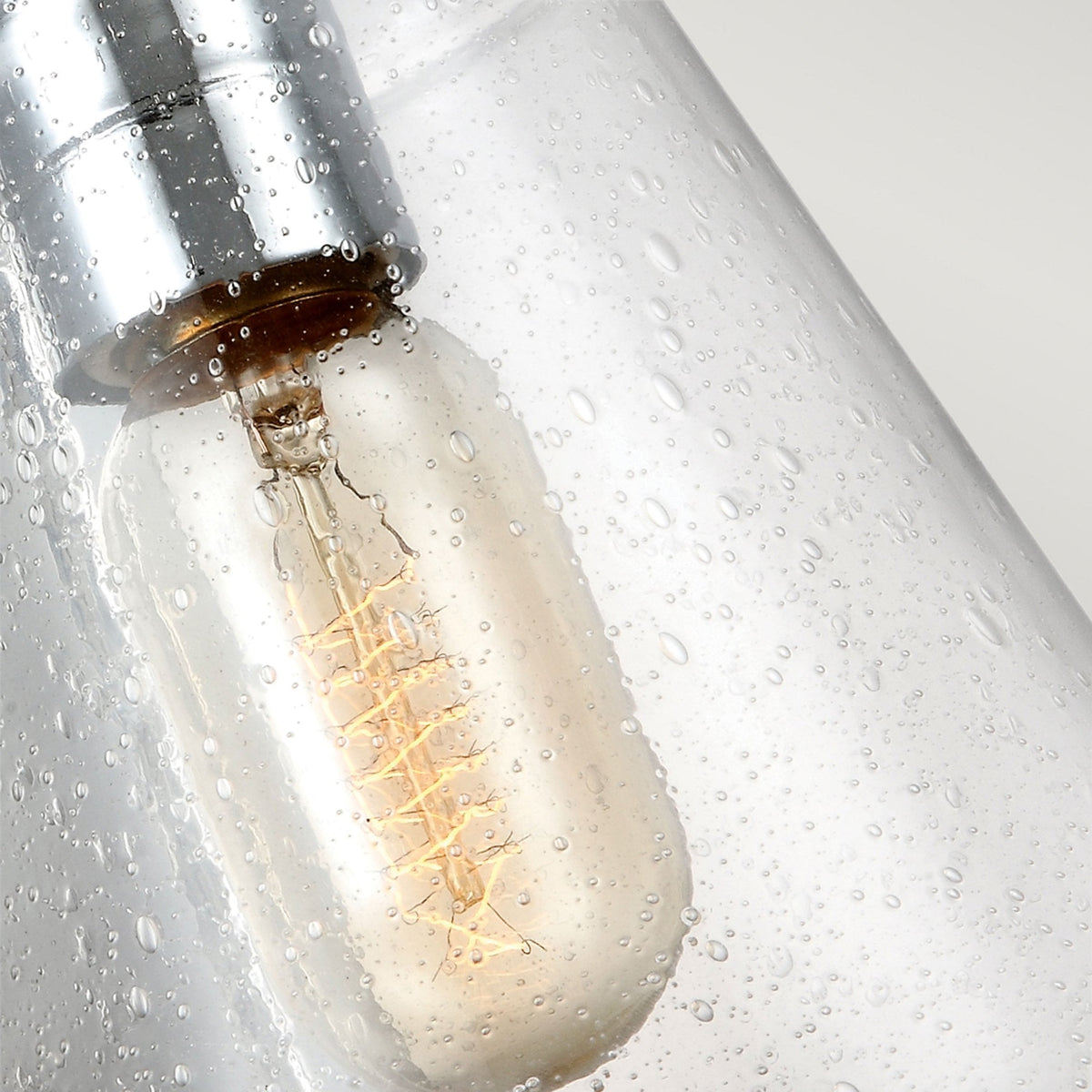 Loras Wall Light in Polished Chrome with Seeded Clear Glass