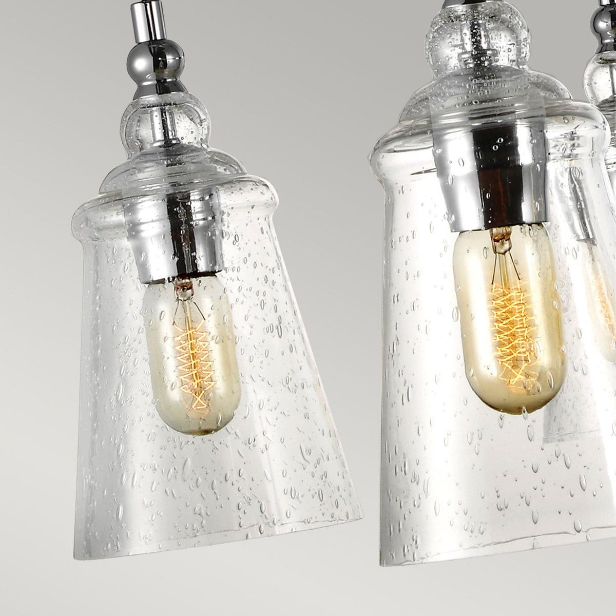 Loras Six Light Chandelier in Polished Chrome with Seeded Clear Glass