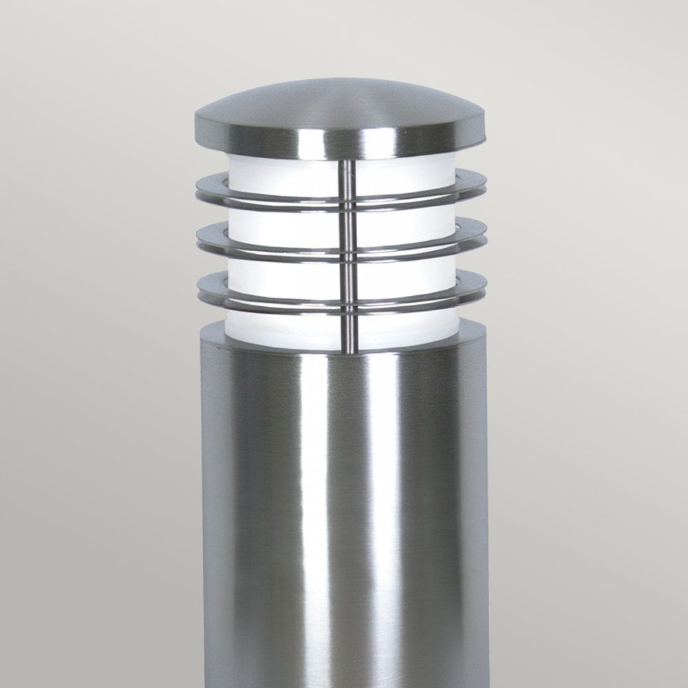 Top half of a modern silver stainless steel outdoor bollard light with a ribbed design.